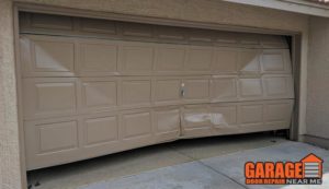 repair damaged garage door panels