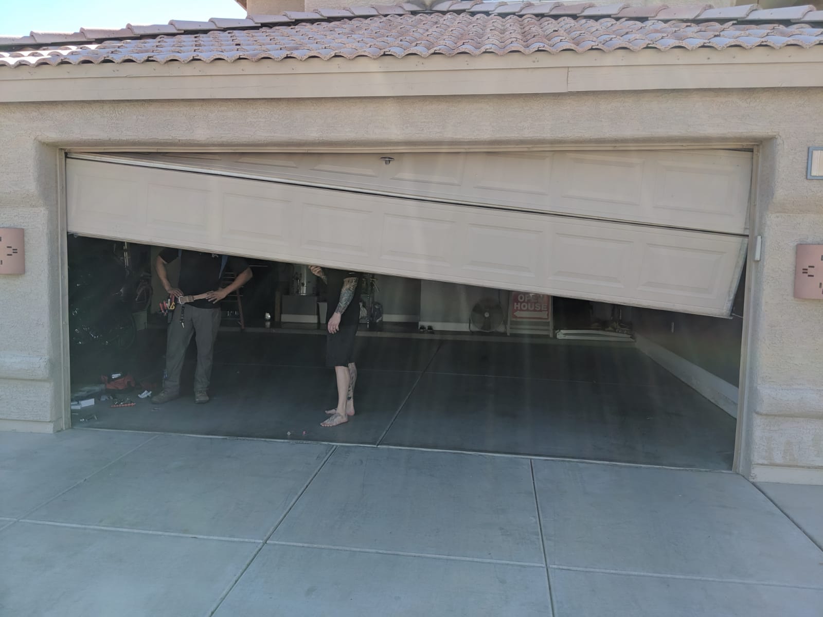 home garage door off tracks repair